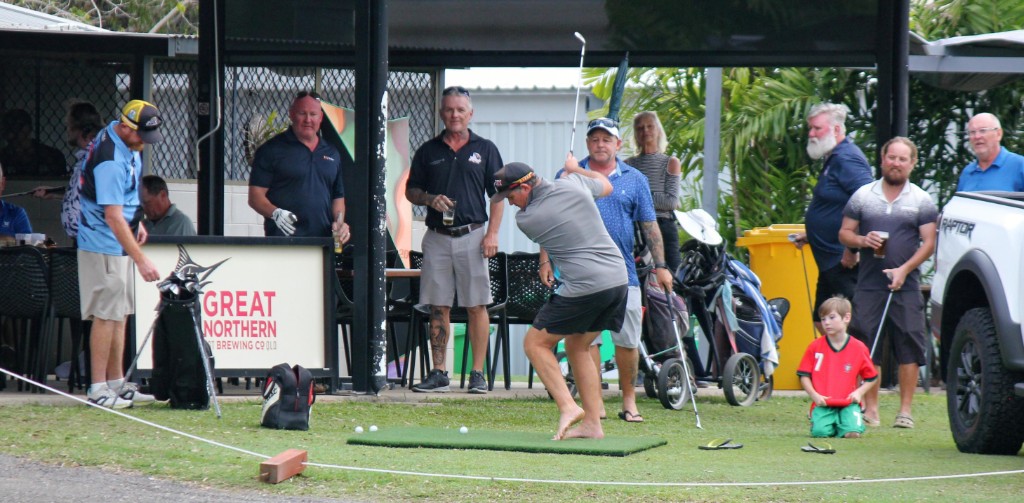 Barefoot driving at a social event with the crowd watching