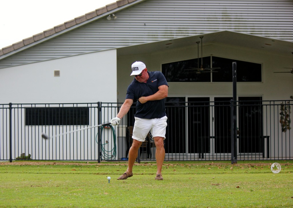 Member mid-swing on the tee
