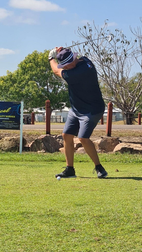 Member mid-backswing on the tee